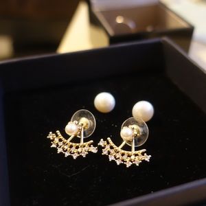 Diamond-studded and Imitation Pearl Earrings